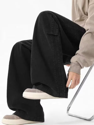 Black men's plus size cargo pants with drawstring and side pocket detail.