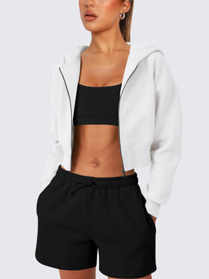 White cropped zip-up hoodie with ribbed hem and zipper detail