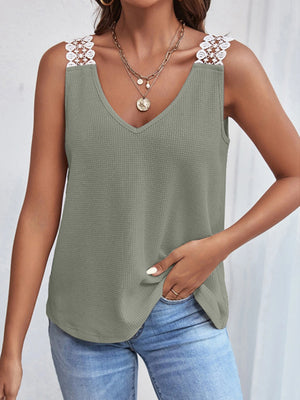 Sage waffle knit tank top with white lace shoulder detail and V-neck.