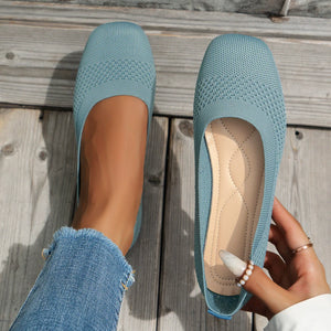 Pastel blue knit square-toe flats with a cushioned insole.