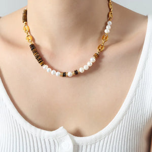 Gold pearl and tiger eye statement necklace with mixed beads and chain links