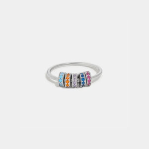Sterling silver ring with five colorful pavé charm beads in blue, orange, purple, dark blue, and pink.