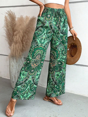 Paisley palazzo trousers in Dark Green with drawstring waist and wide legs.