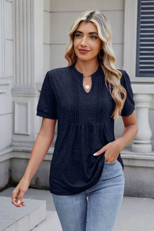 Dark navy pleated yoke henley tee with short sleeves and keyhole neckline.
