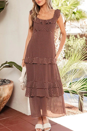 Charming ruffled polka dot maxi dress in brown polyester with a square neckline and short sleeves.