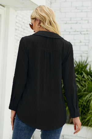 Black textured collared blouse with button cuffs and a curved hem.