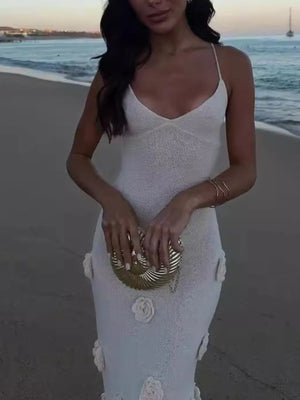 White cami gown with rose appliqués and spaghetti straps