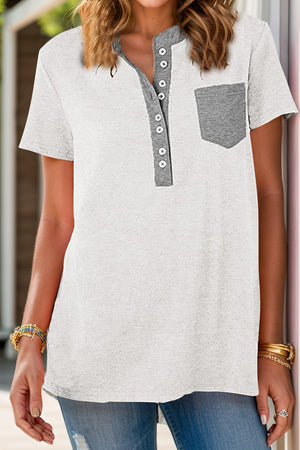 White henley t-shirt with grey contrast collar, buttons, and patch pocket.