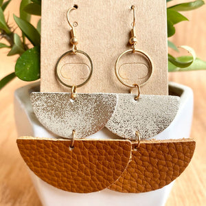Textured leather & metallic half-moon earrings with gold hoops.