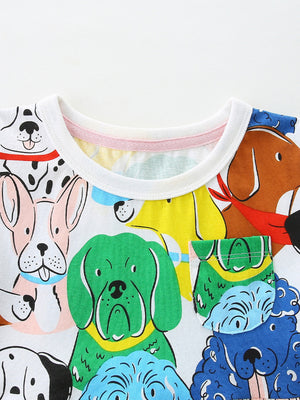 Toddler dress with colorful cartoon dog print and chest pocket.