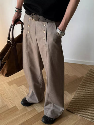 Mocha high-waisted wide leg pants with button detail and a belt.