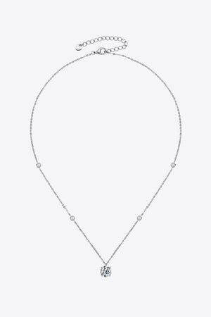 Silver solitaire necklace with scattered accent stones and adjustable chain