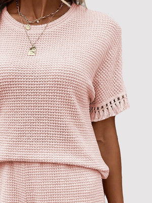 Blush pink waffle knit set with fringe trim on short sleeves.
