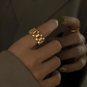 Gold watch link statement ring with adjustable band