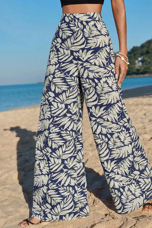 Navy leaf print maternity wide-leg trousers in cotton, high-waisted with a relaxed fit.