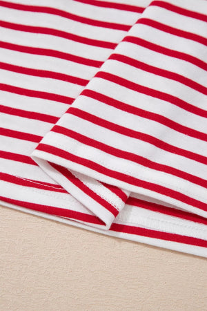 Maternity shirt with red and white stripes, cotton fabric, puff sleeve detail visible.