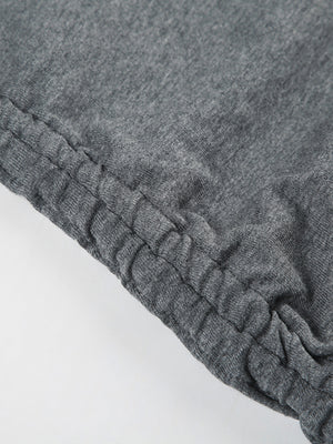 Ruched bodycon mini dress in grey jersey with adjustable drawstring detail.