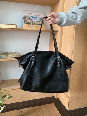 Black pu leather tote bag with star stud details and double straps