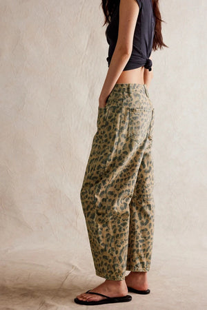 Barrel leg jeans in leopard print with a relaxed fit and button closure.