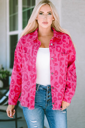 Fuchsia leopard print denim shacket with fringe hem and chest pockets.