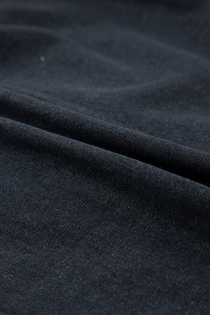 Black denim button-up shirt with frayed ruffle trim detail