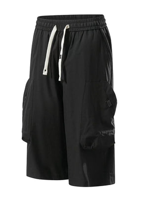 Black cargo capris with adjustable drawstring and large side pockets.
