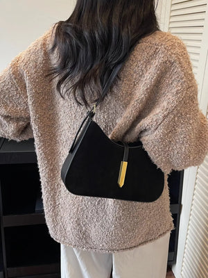 Black suede and leather shoulder bag with gold hardware detail