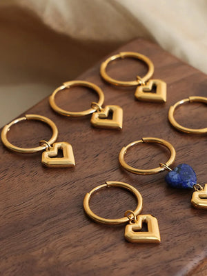 Gold geometric heart hoop earrings with a modern design.