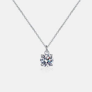 Solitaire moissanite pendant necklace in silver with a delicate chain.