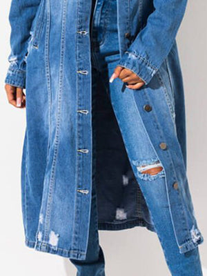 Distressed denim duster coat in light blue with button front and ripped details.
