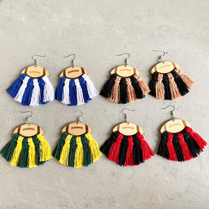 Macrame football tassel earrings in Red/White, Black/Red, Green/Yellow, Black/Peach, Blue/White.