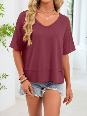 Relaxed fit V-neck t-shirt in wine red with short sleeves and a layered hem detail.