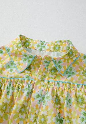 Floral ruffle yoke button-down blouse in yellow green with blue trim detail
