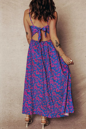 Floral maxi dress with cutout back and tie detail.