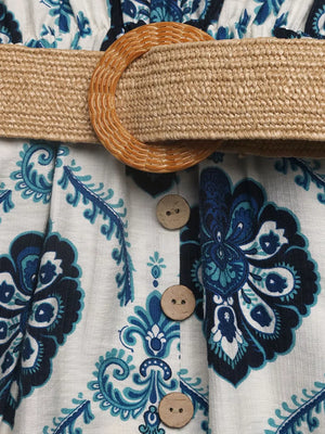Maxi dress with blue print, woven belt, and decorative buttons.