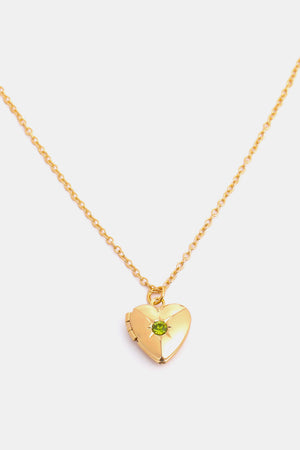 Gold heart locket necklace with green gemstone and 14k gold chain