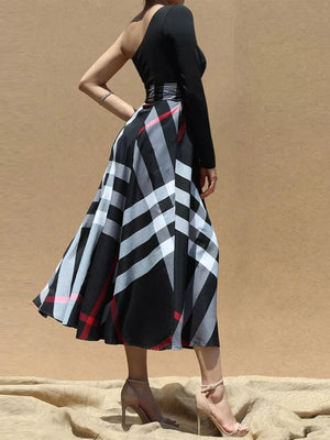 Black one-shoulder midi dress with plaid skirt and waist tie
