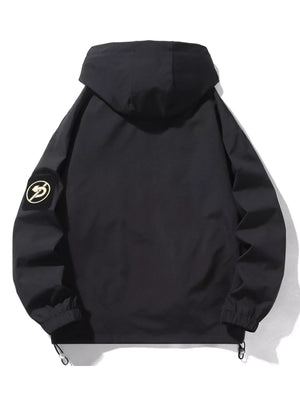 Black hooded utility jacket with drawstring hem and patch detail on sleeve