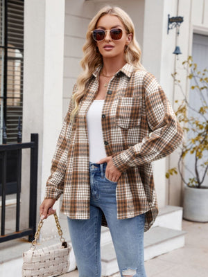 Oversized plaid shirt jacket in brown and white with a button front and chest pocket.