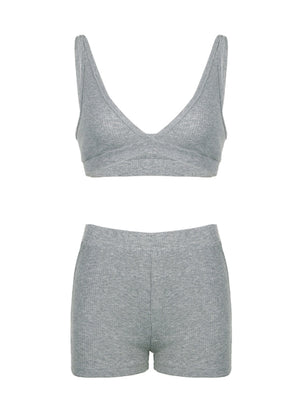 Grey ribbed knit bralette and shorts set with V-neckline and elastic waistband.