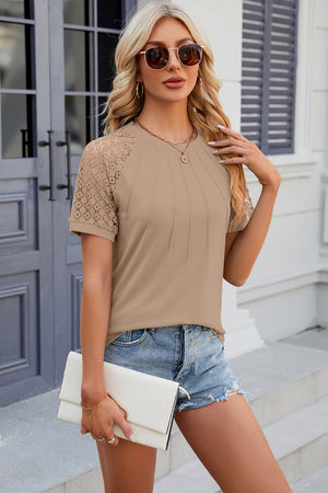 Khaki ribbed tee with lace raglan sleeves and pleated front detail.