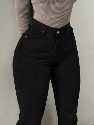 Black denim maternity jeans with pockets and a sculpted flare leg.