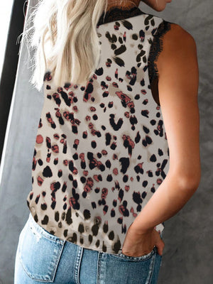 Leopard print camisole with black lace trim detail.