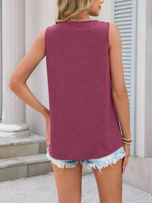 Burgundy sleeveless tank top with lace trim detail on neckline, worn by a woman.