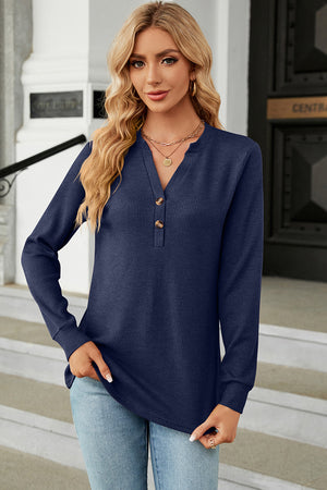 Dark Blue waffle knit henley shirt with button placket and long sleeves.
