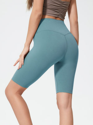 Sculpted Active Bike Shorts in Teal with a high waist and V-seam detail, perfect for workouts.