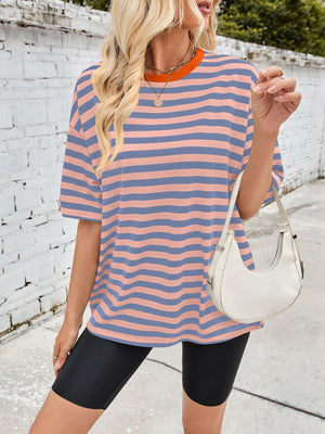 Relaxed fit striped tee with contrast orange neckline and short sleeves.