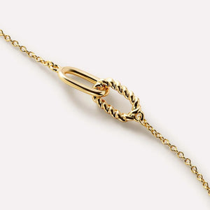 Gold interlocked link necklace with a smooth oval and a twisted oval link.