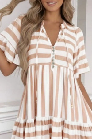 Chic striped v-neck flared summer dress with button detail and tie neck.