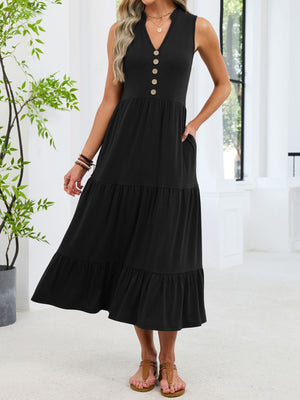 Black tiered midi dress with V-neck, decorative buttons, and pockets.